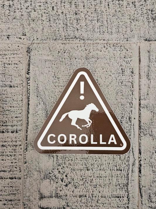 "Caution, Corolla Wild" vinyl sticker